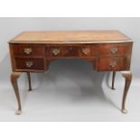 A ladies writing desk with cabriole legs & five dr