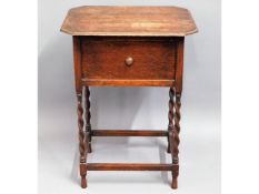 An oak work table with barley twist legs, includin