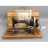 A Frister & Rossmans sewing machine with instructi