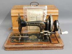 A Frister & Rossmans sewing machine with instructi