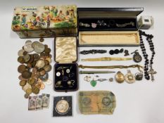 A BOAC tin with mostly costume jewellery contents