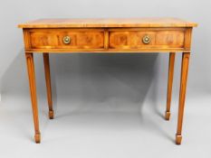 A walnut finish hall table, probably by G.T. Rachk