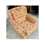 An upholstered Parker Knoll chair, some minor wear