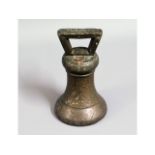 A 19thC. proofed bronze 7lb weight, used currently