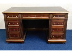 A good quality reproduction mahogany pedestal desk