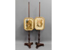 A pair of 19thC. mahogany fire screens with needle