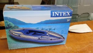 An Intex inflatable kayak, boxed as new including