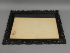 A Chinese Mei Lee carved picture frame, 21.5in x 1