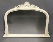 A painted decorative over mantle mirror, 47in wide