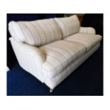 A modern upholstered two seater sofa, 71in wide x