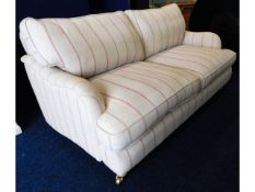 A modern upholstered two seater sofa, 71in wide x