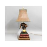 A spelter style elephant book table lamp, 25in hig