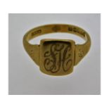 A 9ct gold signet ring initialed "SH", size N/O, 3