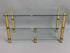 An Optimum glass television stand, 43.25in wide x