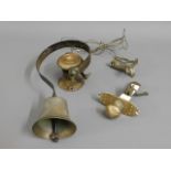 An antique brass door bell system, bell including