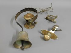 An antique brass door bell system, bell including