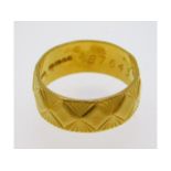 A 22ct gold band, size O/P, 6.45g
