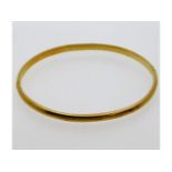 A 14ct gold bangle, 66mm internal measurement at w