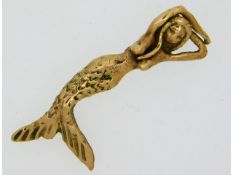 A yellow metal mermaid pendant, 30mm drop, electro