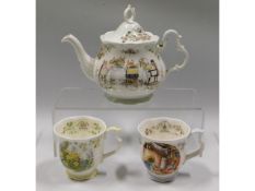 A large sized 1980's Royal Doulton Jill Barklem Brambly Hedge teapot & two seasons cups, Winter & Sp