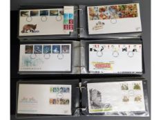 Three first day cover albums, 86 pages, approx. 17