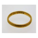 A 22ct gold band, size O, 3.5g
