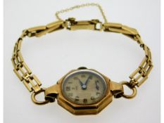 A ladies 9ct gold cased Tudor with rolled gold str