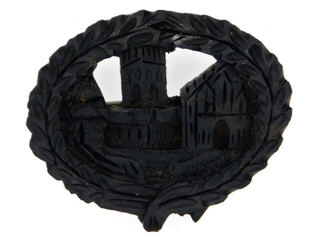 An Irish bog oak brooch, 62mm wide