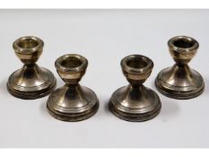 A set of four small silver candle holders, Birming