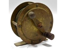 A brass The Milbro fishing reel, 70mm diameter