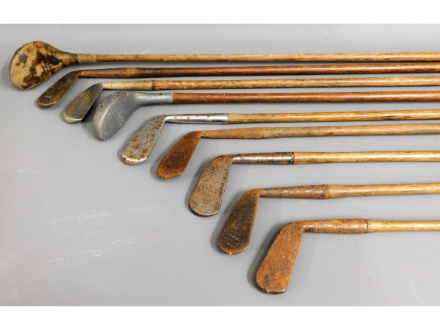 Nine hickory golf clubs with Whitehouse case