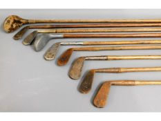 Nine hickory golf clubs with Whitehouse case