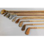 Nine hickory golf clubs with Whitehouse case