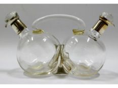 An art deco era conjoined oil & vinegar bottle wit