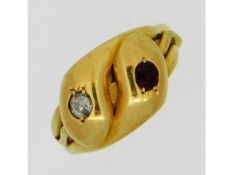 An antique yellow metal snake ring set with diamon