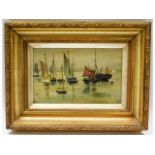 A 19thC. gilt framed oil on panel of sailboats in