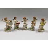 A set of five Dresden cherub musicians, 4.625in ta