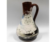 A 19thC. American Rookwood pottery pitcher depicti