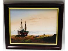 A framed oil on canvas depicting boat at low tide