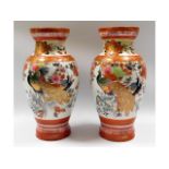 A pair of Japanese Kutani vases with bird & gilded