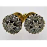 A pair of early 20thC. yellow metal old cut diamon