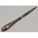 A silver handled letter opener by Henry Hunt, 8.5i
