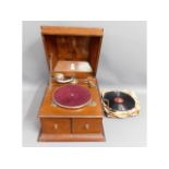 A Ressellbell oak cased gramophone & shellac recor