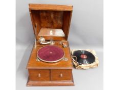 A Ressellbell oak cased gramophone & shellac recor