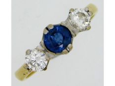 An 18ct gold sapphire & diamond ring set with 0.5ct diamond of good clarity, mid blue hue sapphire 5