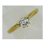 An 18ct gold diamond solitaire ring set with appro