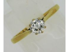 An 18ct gold diamond solitaire ring set with appro