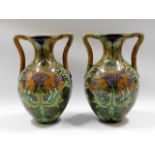 A pair of art nouveau Dutch De Distel faience vase