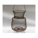 A vintage catch basket, 17in tall