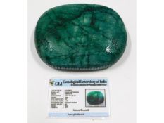 A large 5295ct natural emerald stone paperweight,